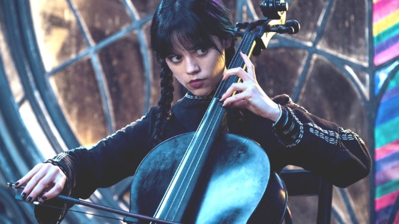 Wednesday Addams playing the cello