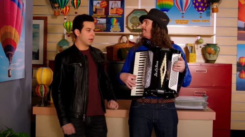 Weird Al playing accordion