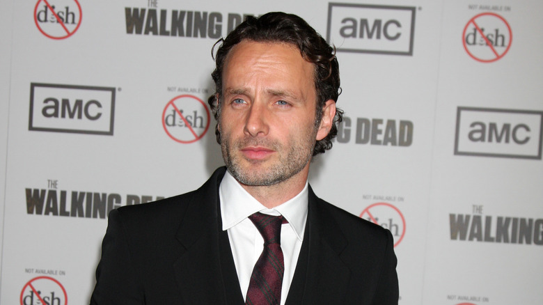 Andrew Lincoln wearing black suit