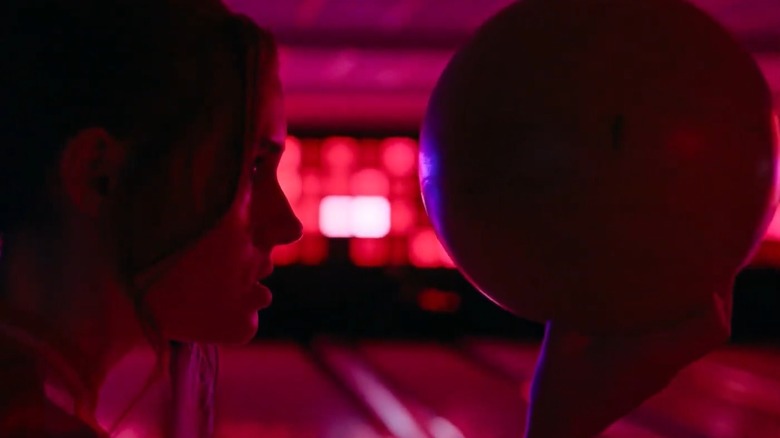 Karen Gillan holds bowling ball