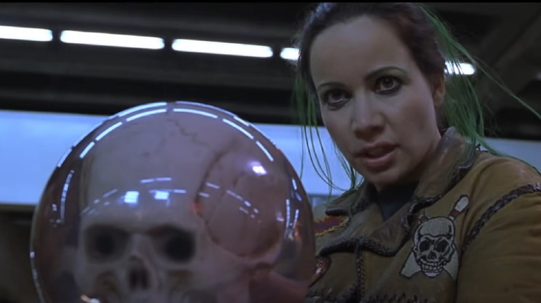 Janeane Garofalo holds bowling ball