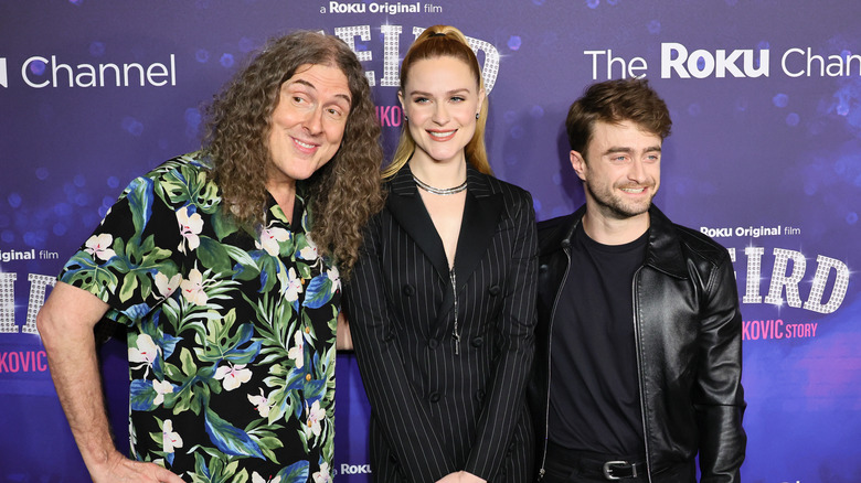 "Weird Al" Yankovic, Evan Rachel Wood, and Daniel Radcliffe posing at premiere