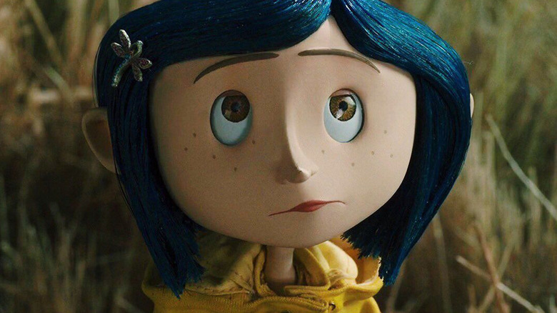 Coraline in raincoat