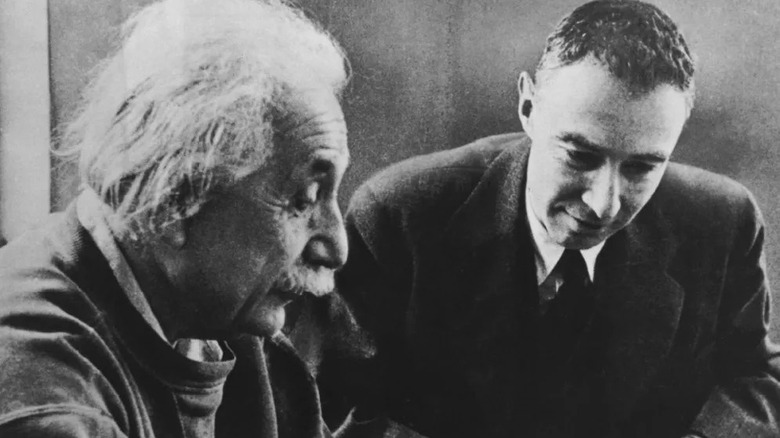 A real photo of Einstein and Oppenheimer looking at something