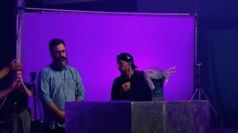 Jared Hess and an effects person on the set of A Minecraft Movie