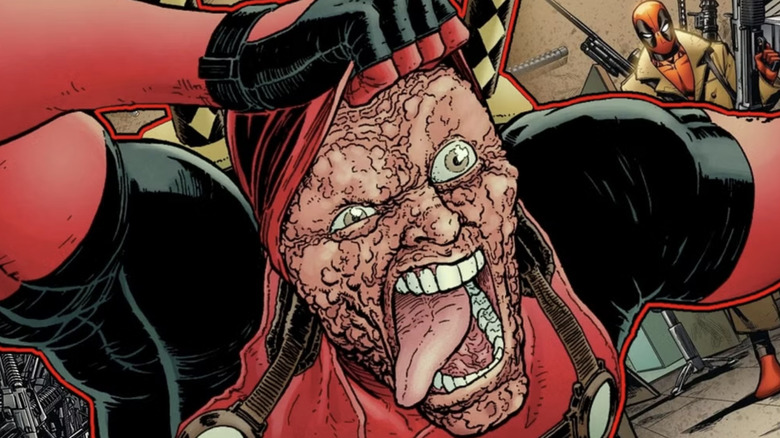 Deadpool pulls up his mask to reveal his scarred face while wagging his tongue wildly.