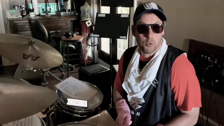 Sandler playing drums in quarantine