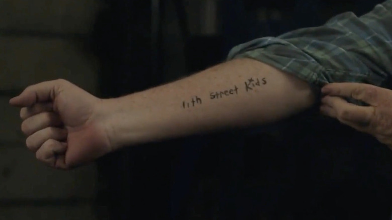 John Economos Steve Agee shows his 11th Street Kids tattoo