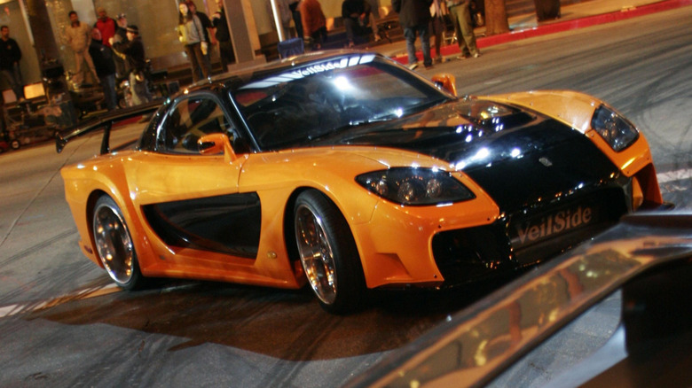 Han's VeilSide RX-7 in Tokyo at night