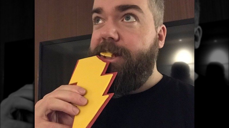 David F. Sandberg eating Shazam lightning bolt