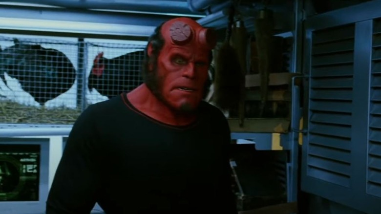 Hellboy wearing black shirt