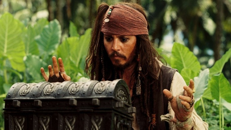 Jack Sparrow looking at a chest