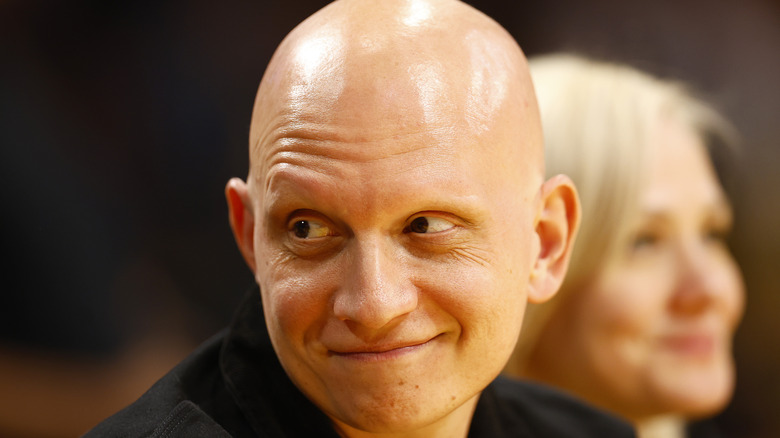 Anthony Carrigan smirking at a panel