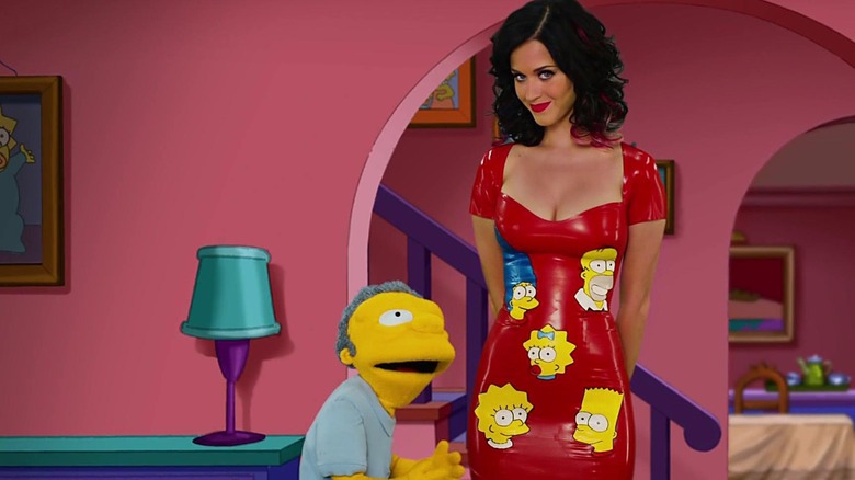 Katy Perry looks down on Moe