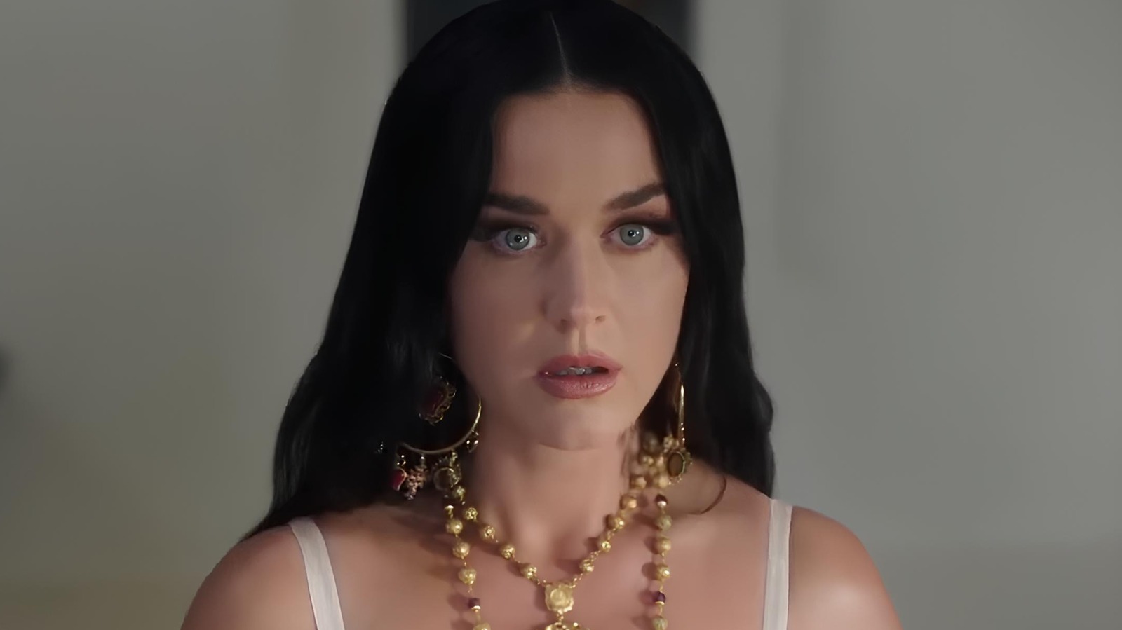 What Famous Pop Singer Stars As The New Devotion Perfume Commercial