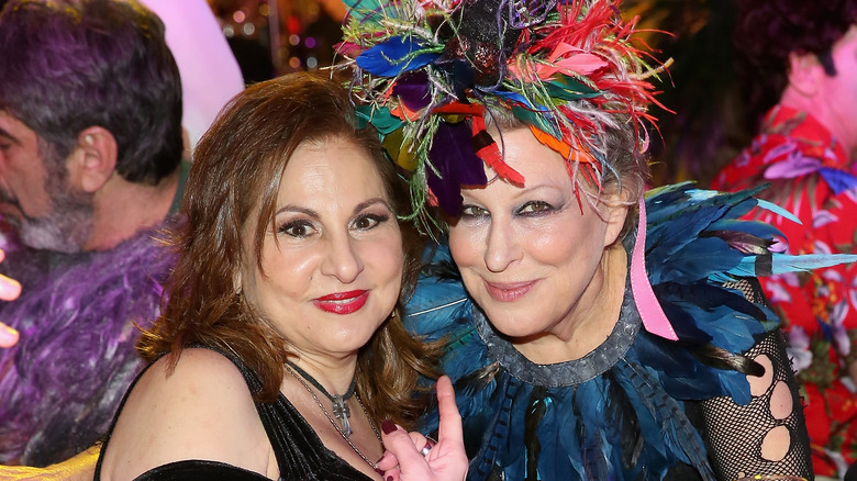 Kathy Najimy smiling with Bette Midler