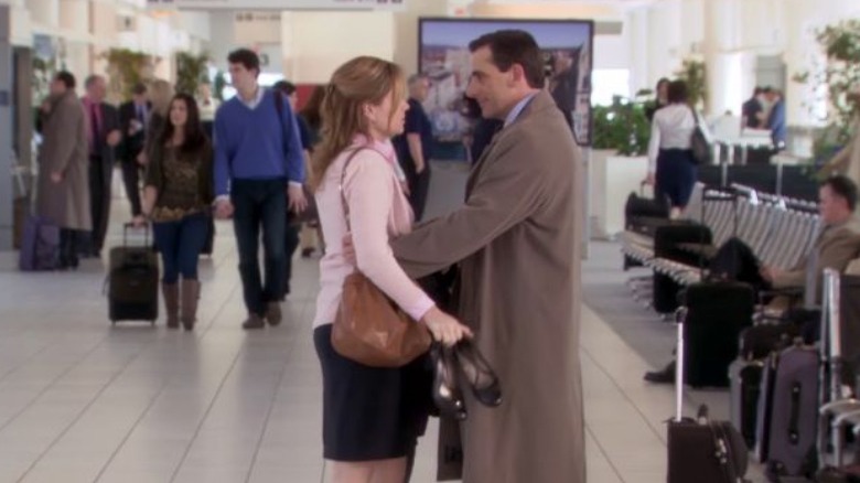 Pam and Michael embracing