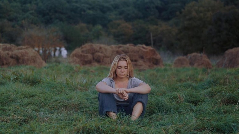 Dani meditates in the field