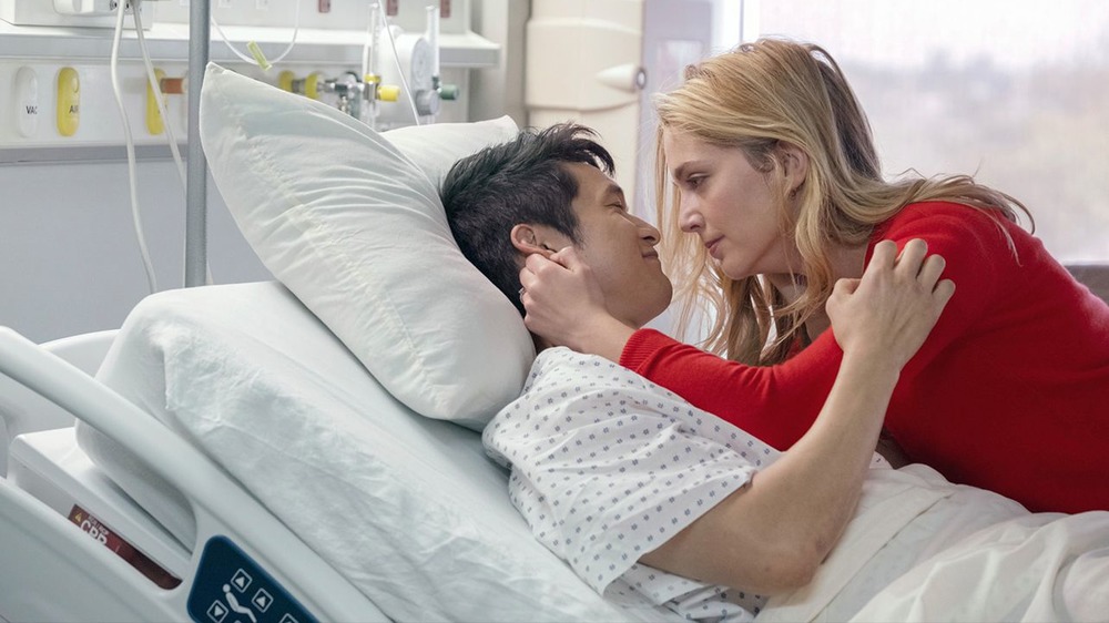 Sol and Jen in a hospital bed