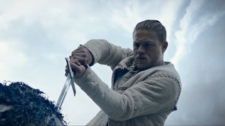 King Arthur pulling Excalibur 