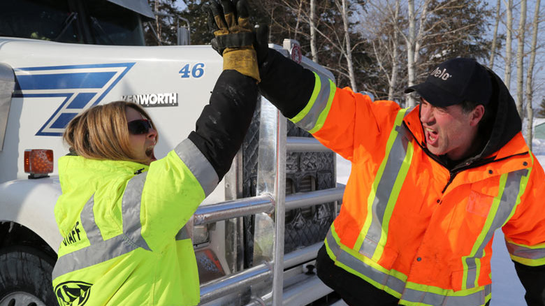 Darrell Ward highfiving in Ice Road Truckers