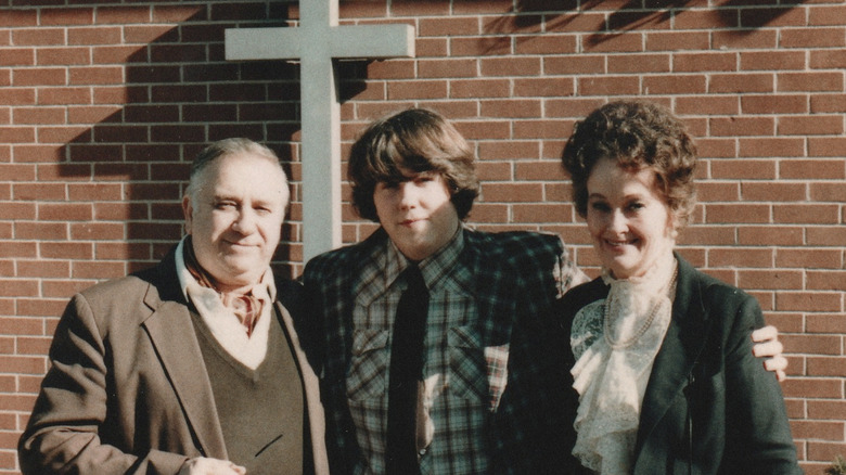 David Glatzel in between Ed and Lorraine Warren