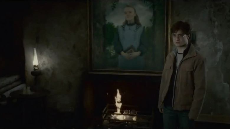 Harry standing with Ariana's portrait in Harry Potter in a Deathly Hallows