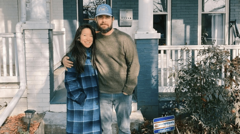 Eddie and Natalie outside house