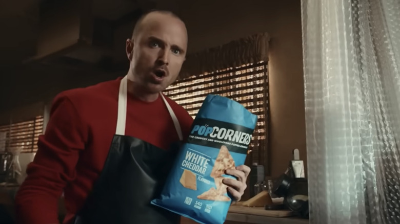 Jesse Pinkman holding a bag of PopCorners