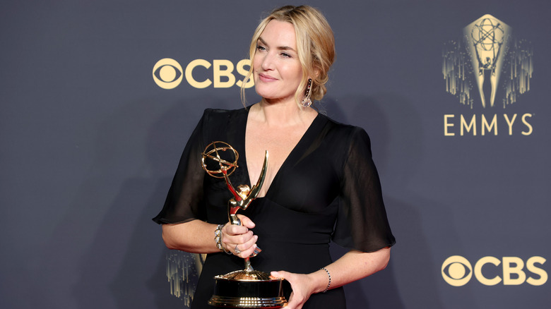 Kate Winslet holding Emmy