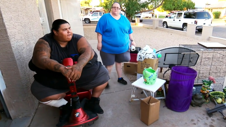 Michael and Roni Dominguez packing their belongings