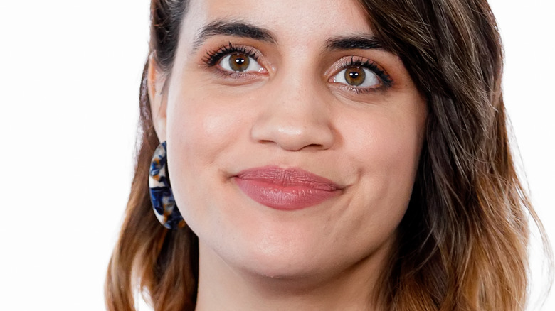 Natalie Morales smiling