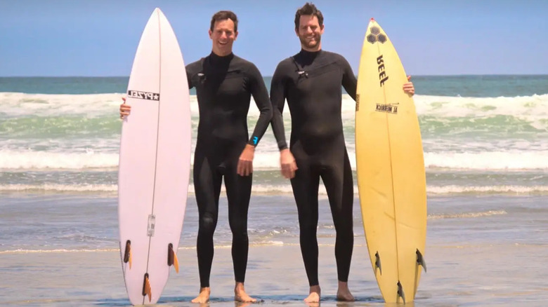 Michael and Charlie with surfboards