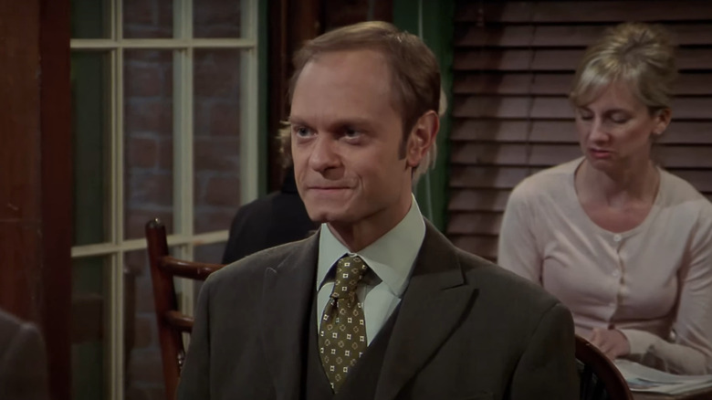 Niles grimacing