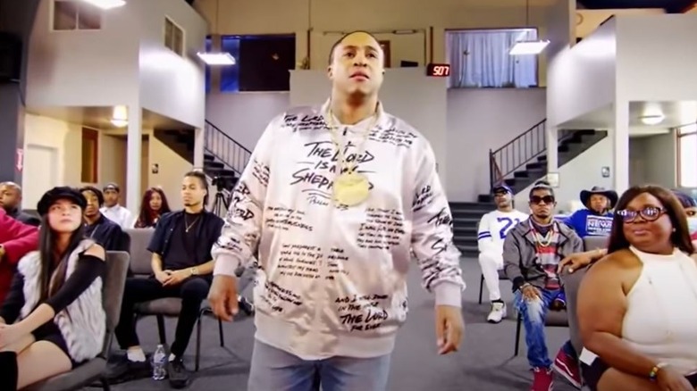 Orlando Brown walking in church