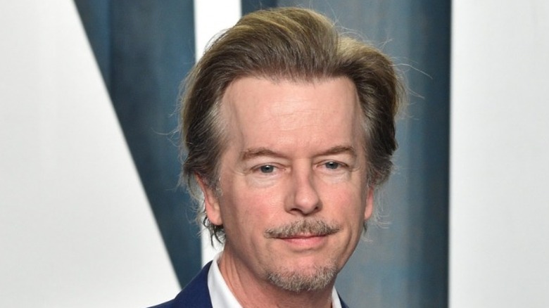 David Spade closed mouth smile 