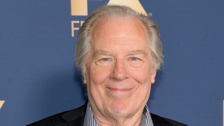 Michael McKean closed mouth smile