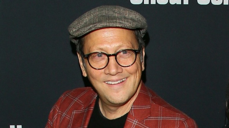 Rob Schneider smiling hat 