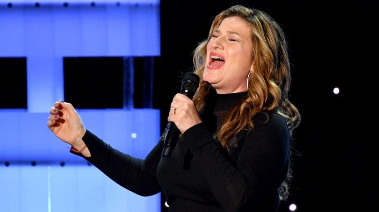 Ana Gasteyer singing on stage 