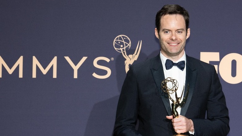 Bill Hader holding an Emmy Award