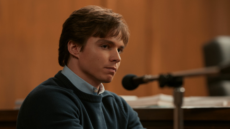 Nicholas Chavez as Lyle Menendez testifying in court in "Monsters: The Lyle And Erik Menendez Story."