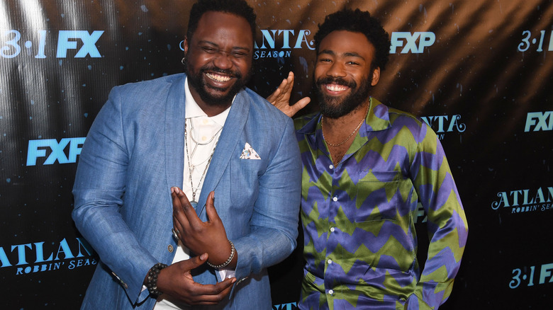 Donald Glover and Brian Tyree Henry laughing