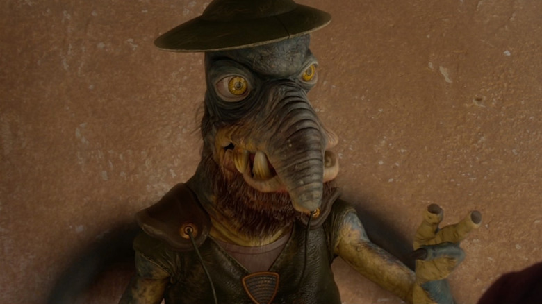 Watto wearing hat