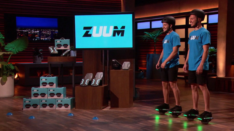 Guerra and Buechler demonstrating Zuum shoes 