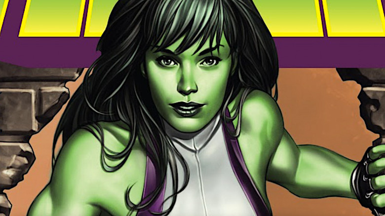 She-Hulk climbing through a hole in a brick wall