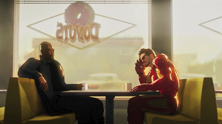 Nick Fury sits across the table from Tony Stark