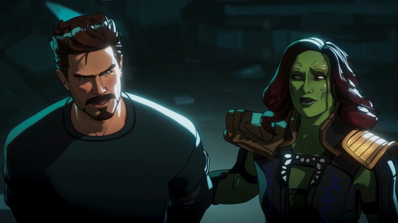 Gamora looks at Tony Stark