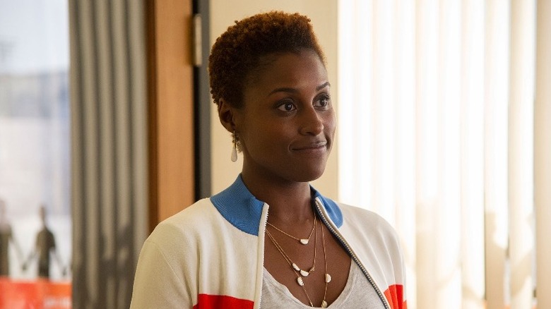 Issa Rae smirking on Insecure 