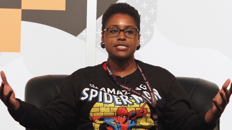 Issa Rae speaking on a panel 