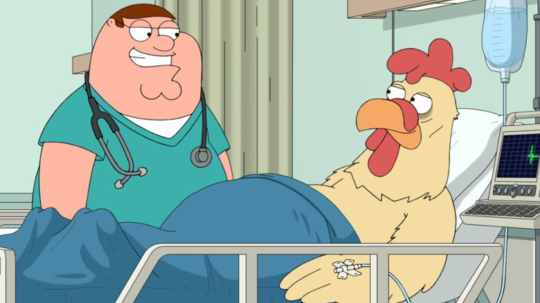 Peter and the giant chicken smile at each other